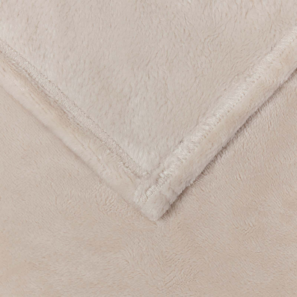 plaid canapé beige